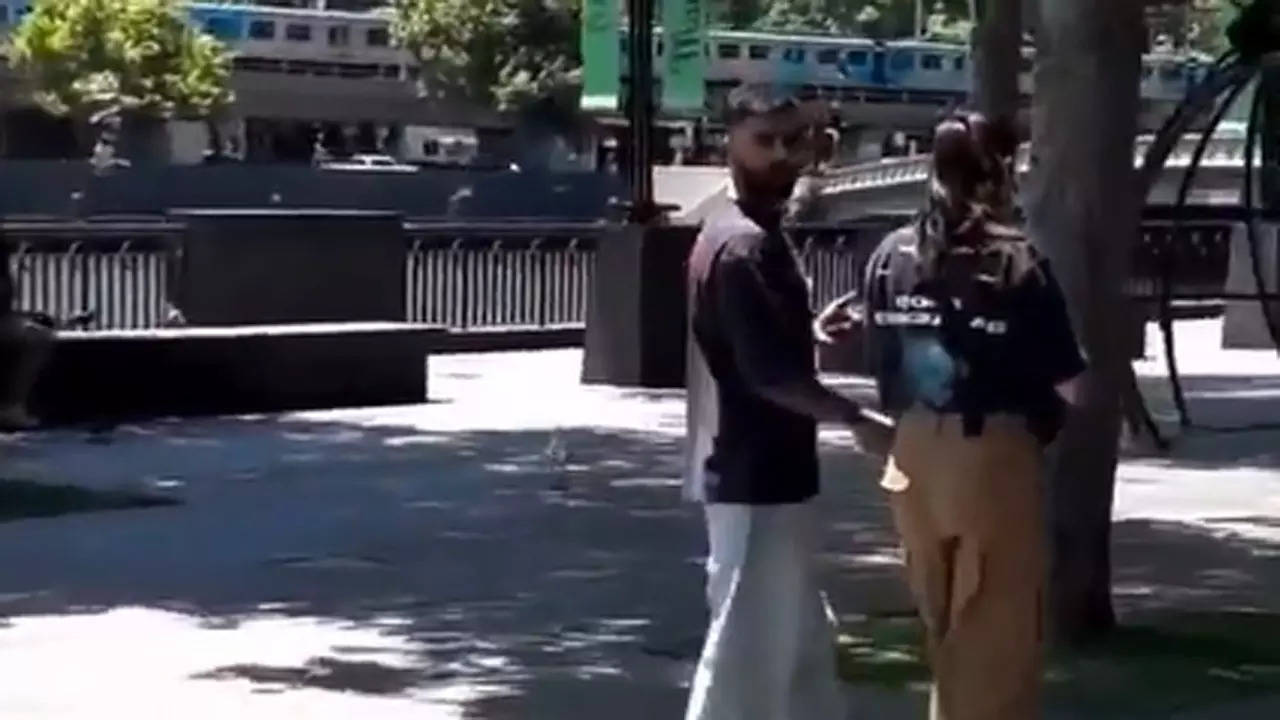 Virat, Anushka spotted strolling in Melbourne city – Watch