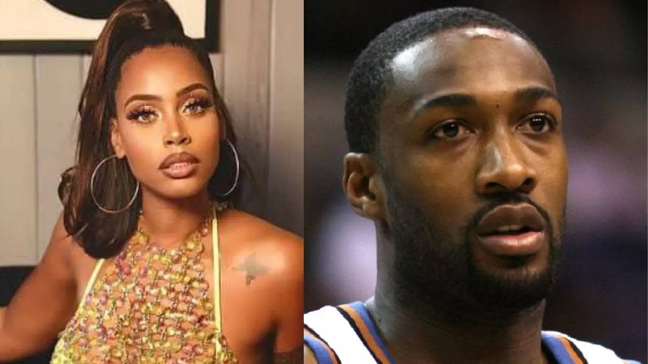 Gilbert Arenas is all smiles as girlfriend, Melli Monaco, presents him..