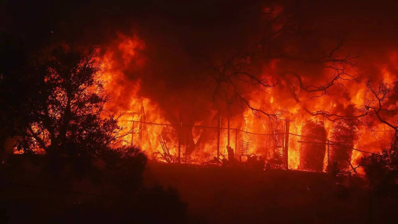 US wildfire: 30,000 ordered to evacuate as blaze rages through LA hills